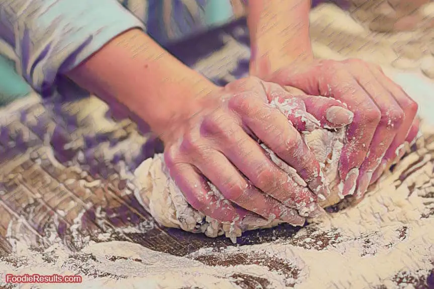 ingredients Flour on hands kneading dough