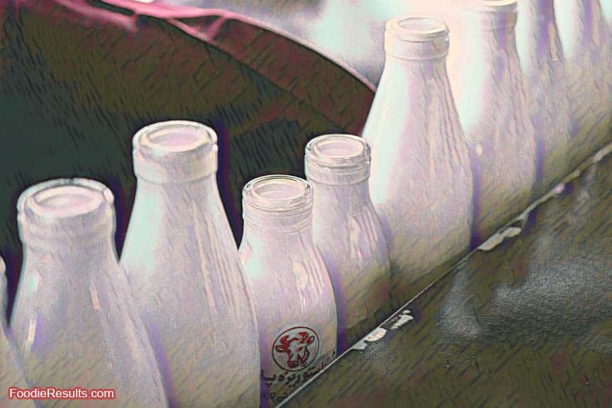 Milk bottles in a factory conveyer 